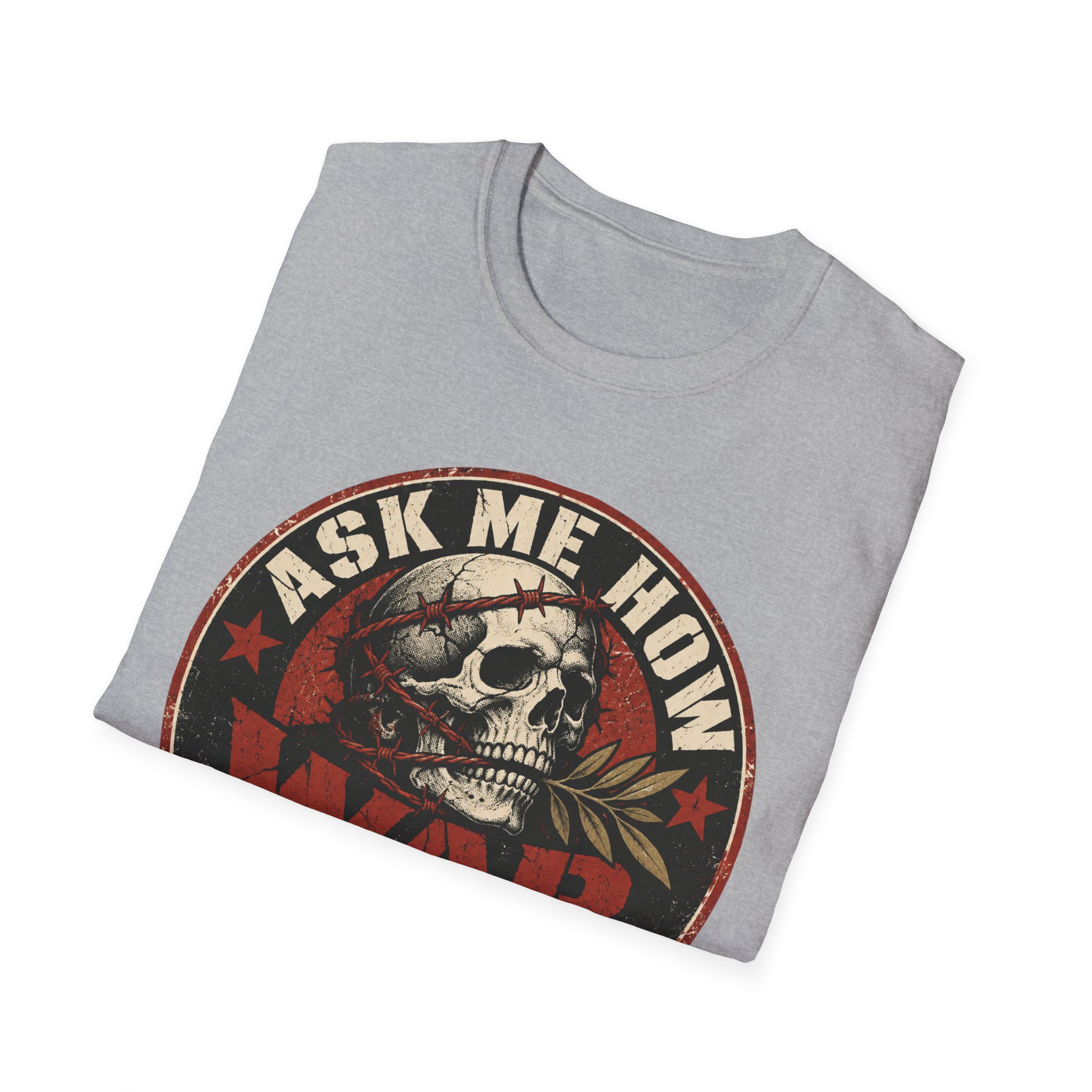Folded Ask Me How War Is the Health of the State skull tee in Sport Grey showing the badge print up close.
