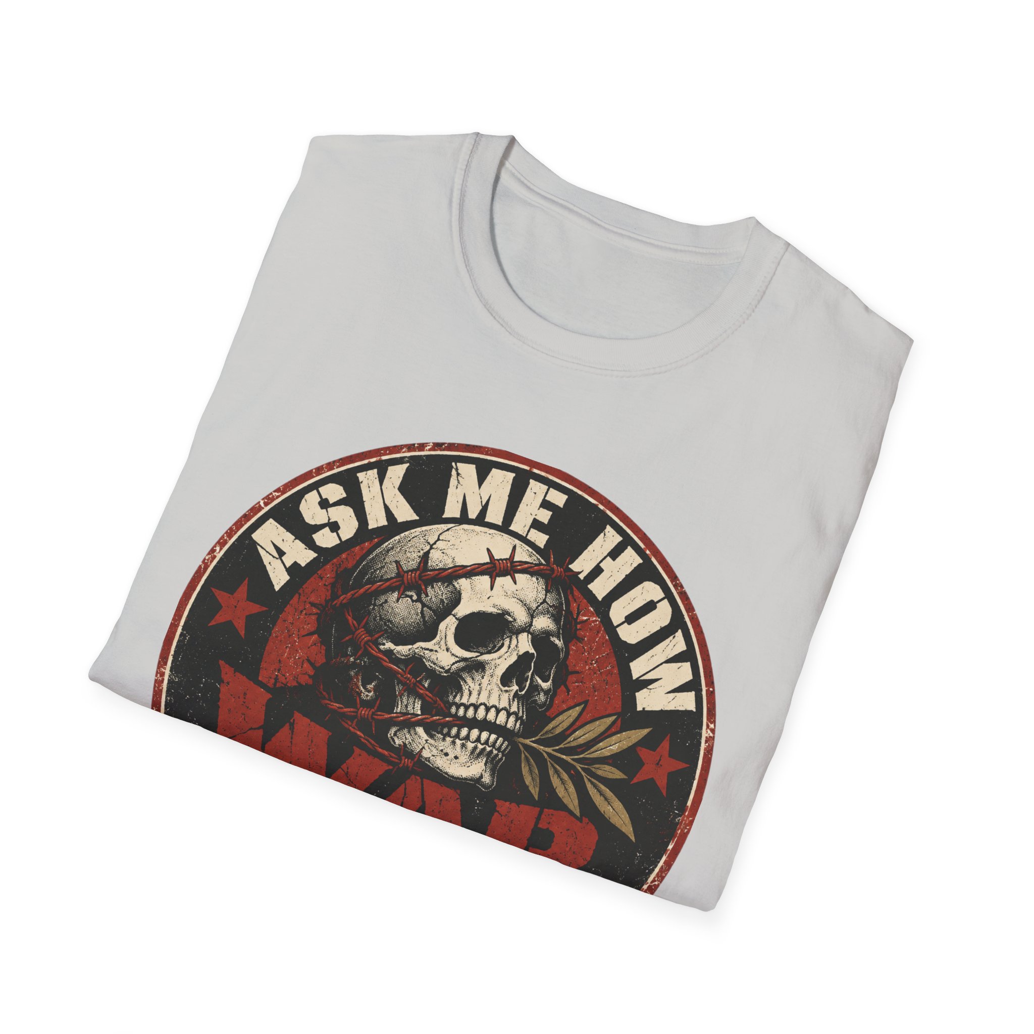 Folded Ask Me How War Is the Health of the State skull tee in Ice Grey showing the badge print up close.